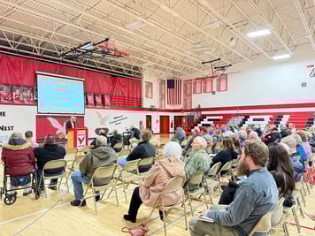 Residents fill the Hustisford High School Gym to hear about consolidation and dissolution laws.